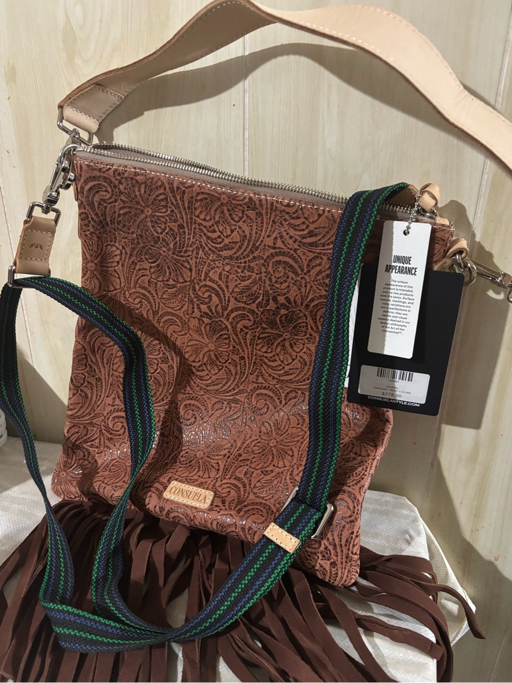 Consuela Embossed Floral Leather Crossbody in Rustic Brown with Striped Strap